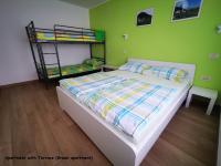 Postel nebo postele na pokoji v ubytování Apartment and room Anica