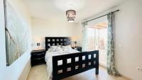 Postel nebo postele na pokoji v ubytování Tropical penthouse
