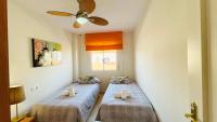 Postel nebo postele na pokoji v ubytování Tropical penthouse