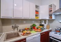 Kuchyňa alebo kuchynka v ubytovaní City Apartment TODOR