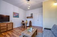 Televízia a/alebo spoločenská miestnosť v ubytovaní City Apartment TODOR