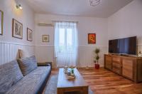 Televízia a/alebo spoločenská miestnosť v ubytovaní City Apartment TODOR