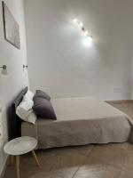 A bed or beds in a room at Civico 47