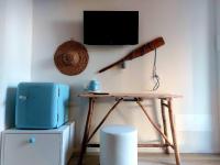 Televízia a/alebo spoločenská miestnosť v ubytovaní Accanto Alle Mura Rooms & Relax Spa