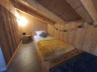 Ein Bett oder Betten in einem Zimmer der Unterkunft Chalet cosy et moderne vue montagnes