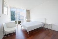 A bed or beds in a room at Jesolo Lido Village Immobiliare Pacella