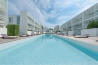 The swimming pool at or close to Jesolo Lido Village Immobiliare Pacella