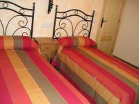 Postel nebo postele na pokoji v ubytování Casa rural Molino Pataslargas