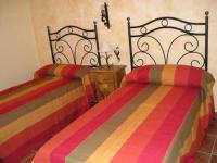 Postel nebo postele na pokoji v ubytování Casa rural Molino Pataslargas