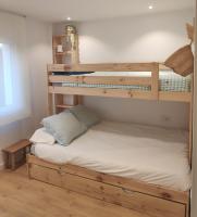 Postel nebo postele na pokoji v ubytování Grup D'Aro Apartment