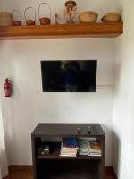 TV a/nebo společenská místnost v ubytování Tijarafe 2