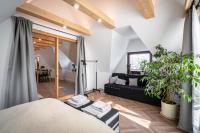Posteľ alebo postele v izbe v ubytovaní Apartamenty zaSzczyty
