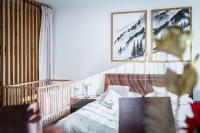 Posteľ alebo postele v izbe v ubytovaní Apartamenty zaSzczyty