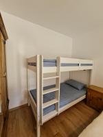 Postel nebo postele na pokoji v ubytování Pirin Golf Apartment HOME with private garden