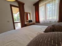 Postel nebo postele na pokoji v ubytování Pirin Golf Apartment HOME with private garden