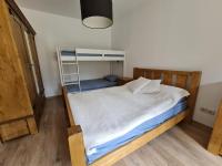 Postel nebo postele na pokoji v ubytování Pirin Golf Apartment HOME with private garden
