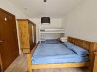 Postel nebo postele na pokoji v ubytování Pirin Golf Apartment HOME with private garden