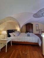 Posteľ alebo postele v izbe v ubytovaní My Loft Catania