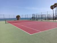 Tenis alebo squash v ubytovaní Apartamento en urb primera linea de playa alebo jeho okolí