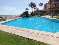 Bazén v ubytovaní Apartamento en urb primera linea de playa alebo v jeho blízkosti