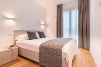 Superior Beach Aparthotelにあるベッド