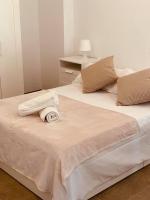 Posteľ alebo postele v izbe v ubytovaní Apartamentos Pintor Losada