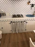 Kuchyňa alebo kuchynka v ubytovaní Casa Porta Mulini