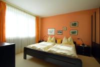 Posteľ alebo postele v izbe v ubytovaní Ferienappartement Regina