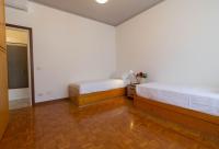 Posteľ alebo postele v izbe v ubytovaní Mamma Ciccia Holiday Home - Casa Imperia