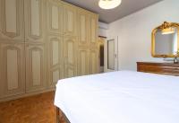 Posteľ alebo postele v izbe v ubytovaní Mamma Ciccia Holiday Home - Casa Imperia