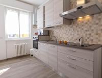 Kuchyňa alebo kuchynka v ubytovaní Mamma Ciccia Holiday Home - Casa Imperia