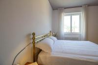 Posteľ alebo postele v izbe v ubytovaní Mamma Ciccia Holiday Home - Casa Imperia