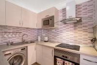 A kitchen or kitchenette at Apartamento Porís
