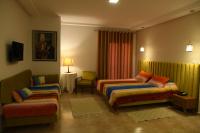 Postel nebo postele na pokoji v ubytování Larimar Hôtel Sfax