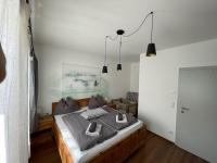 Łóżko lub łóżka w pokoju w obiekcie Kunstwerk AppARTement