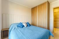 Posteľ alebo postele v izbe v ubytovaní APARTAMENT NA ARTYLERYJSKIEJ