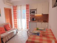 Kuchyň nebo kuchyňský kout v ubytování Apartments A&A