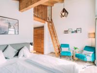 Łóżko lub łóżka w pokoju w obiekcie Tauern Lodge XL