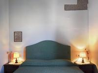 Posteľ alebo postele v izbe v ubytovaní Belvilla by OYO Serene Apartment with Garden