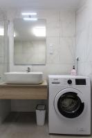 Kúpeľňa v ubytovaní Coral Luxury Apartment