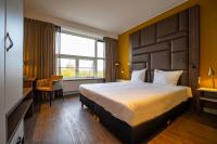Een bed of bedden in een kamer bij Fletcher Hotel-Restaurant Arion-Vlissingen