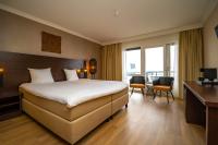 Een bed of bedden in een kamer bij Fletcher Hotel-Restaurant Arion-Vlissingen