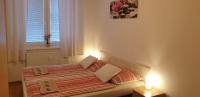 Posteľ alebo postele v izbe v ubytovaní APARTMÁN BRATISLAVA city & parking