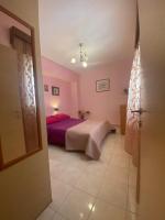 Posteľ alebo postele v izbe v ubytovaní Galini Apartment