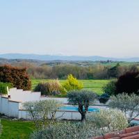 a view of a garden from the roof of a house at Au Temps Suspendu in Saint-Martin-dʼOydes