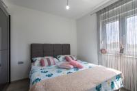 Postel nebo postele na pokoji v ubytování Apartman Nikol