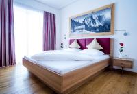 Posteľ alebo postele v izbe v ubytovaní Apartments Dolomit-Royal