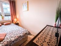 Posteľ alebo postele v izbe v ubytovaní Markowe Apartamenty Złoty Park