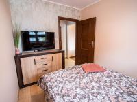 Posteľ alebo postele v izbe v ubytovaní Markowe Apartamenty Złoty Park