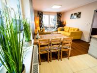Posedenie v ubytovaní Markowe Apartamenty Złoty Park